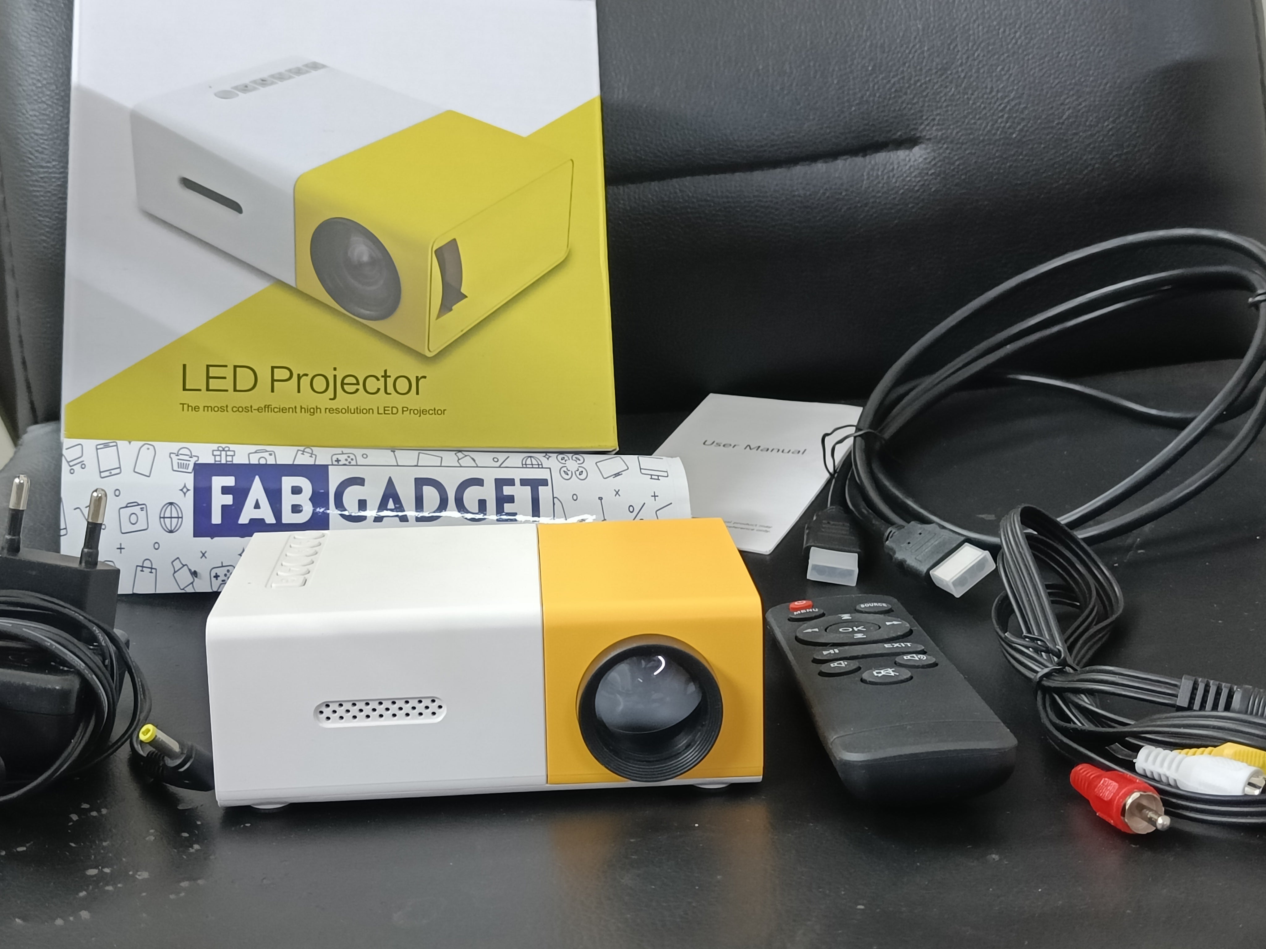 Fabgadget Projector, 400LM Portable Mini Home Theater LED Projector with Remote Controller, 3500 lm LED Corded Projector UC500 Support HDMI, AV, SD, USB Interfaces (Yellow)